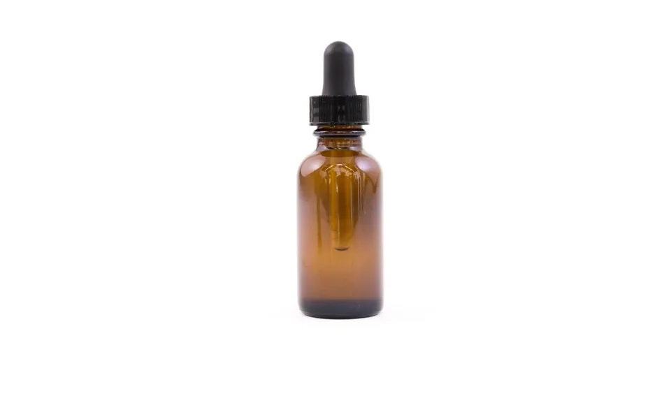 Amber glass dropper bottle on white